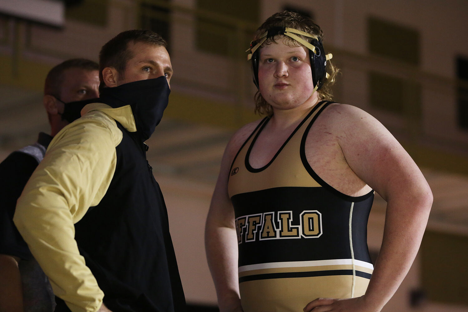 Garrett Traylor talks with senior Triston Peter